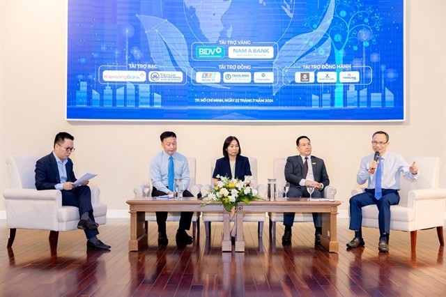 Panellists at the 2024 Green Finance Forum held in HCM City on July 22 discuss opportunities for developing financial products in Việt Nam. — Photo courtesy of thoibaotaichinhvietnam.vn