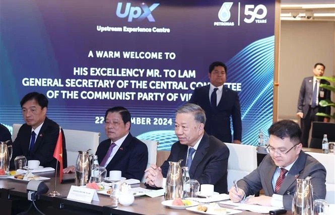 Party chief visits Malaysia’s national oil & gas company