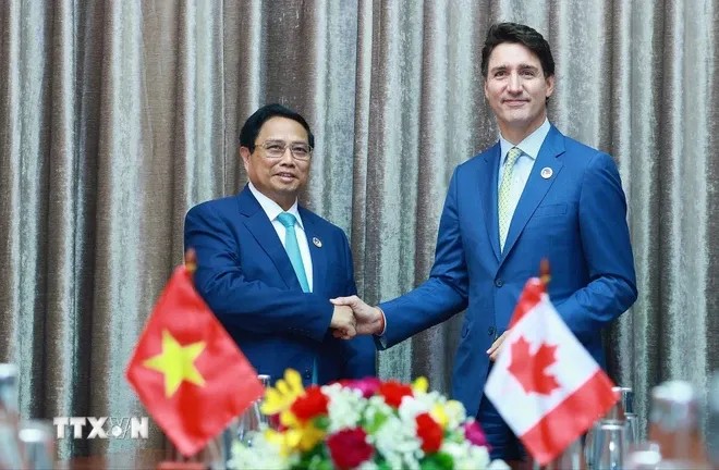 Vietnamese Prime Minister Pham Minh Chinh holds talks with Prime Minister of Canada Justin Trudeau on October 10 in Vientiane, Laos